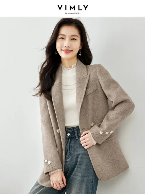 This warm and elegant jacket combines the luxurious feel of a woolen tailored coat with the sparkle of sequins, creating a unique blend of vintage charm and modern sophistication.