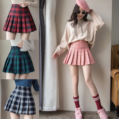 This high-waisted, pleated plaid mini skirt features a trendy zipper closure, combining preppy schoolgirl charm with a sexy edge