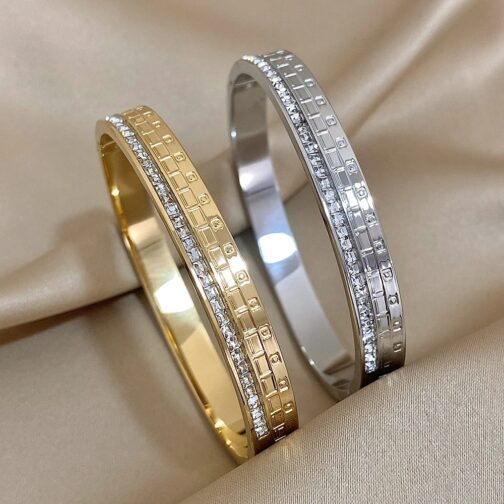 Their versatile design complements any outfit, adding a touch of sophistication to your look. Elevate your accessory collection with these chic and elegant bangles