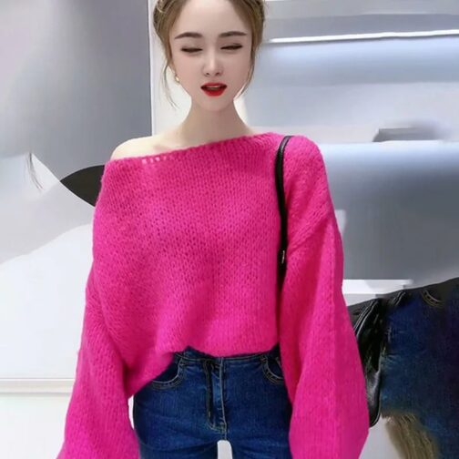 Available in a fashionable pink hue, this sweater pairs effortlessly with jeans, skirts, or leggings for a versatile outfit 3