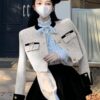 Crafted from high-quality tweed, this jacket is both durable and chic, making it ideal for various occasions, from casual outings to formal events. 1