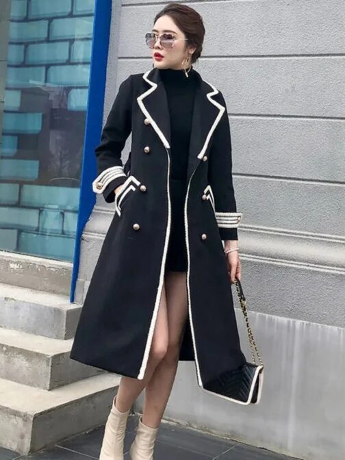 Designed for women with a refined taste, this high-grade coat features a classic double-breasted front and a sophisticated white and black line pattern 3