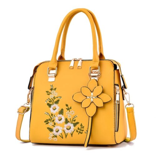 This chic zipper handbag features exquisite floral decor, adding a touch of elegance to any outfit