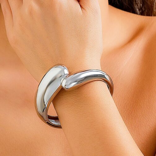 The adjustable cuff and open bracelet design ensure a comfortable and custom fit for every wrist 2