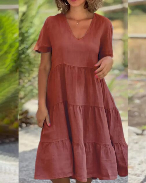 Crafted from a breathable cotton and linen blend, this dress ensures you stay cool and comfortable in warm weather. 3