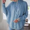The versatile design makes it easy to pair with jeans, skirts, or leggings for a chic, casual look.