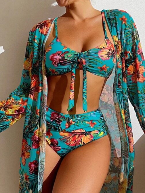 This stunning bikini set features a vibrant floral print that exudes tropical vibes, perfect for summer. 4