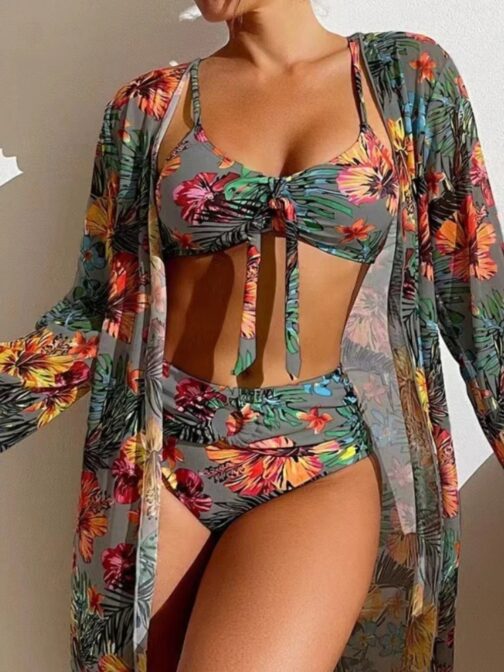 This stunning bikini set features a vibrant floral print that exudes tropical vibes, perfect for summer. 2