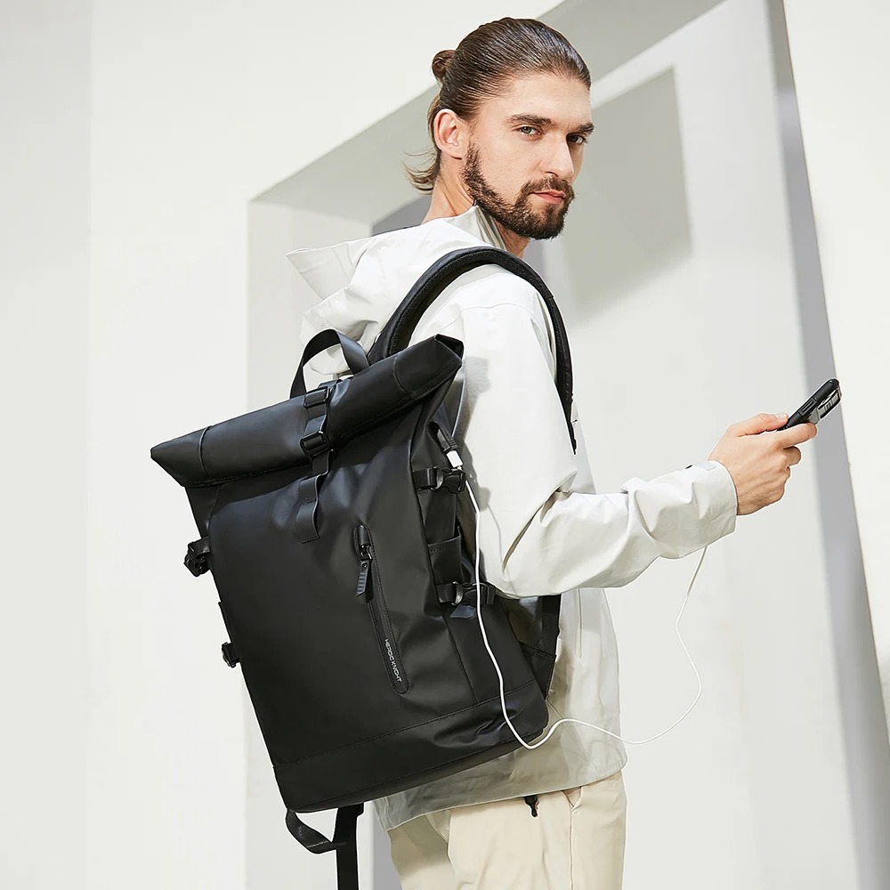 With its sleek design and durable construction, this backpack combines functionality and style, making it a practical and fashionable accessory for men. 1