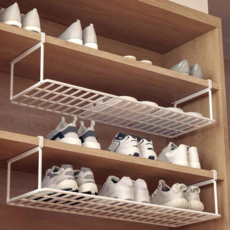 Made from durable materials, this shoe storage shelf is sturdy and built to last, providing a practical solution for compact living areas. 1