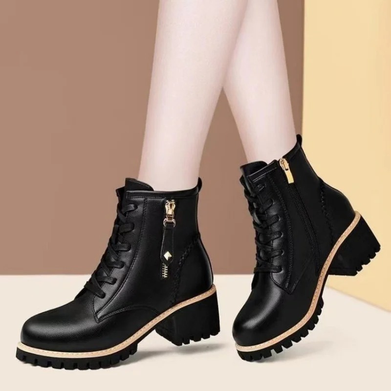 These lace-up and side-zip combat boots are crafted from high-quality leather, offering a sleek yet rugged look perfect for everyday wear 1