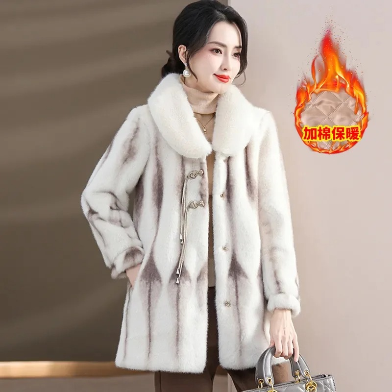 This high-grade mink fur coat features a thick, plush texture that provides exceptional insulation against cold weather while maintaining a sophisticated look 1