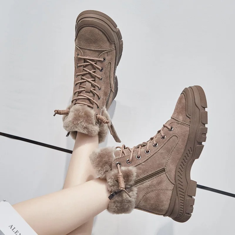Designed in a versatile ankle-boot sneaker style, they offer the perfect balance of casual comfort and winter protection. 1