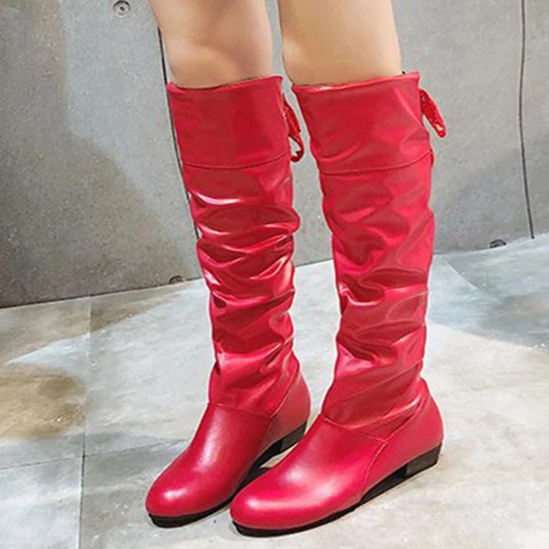 The knee-high length provides warmth and coverage during cooler seasons, while the versatile design pairs effortlessly with skirts, dresses, or leggings 4