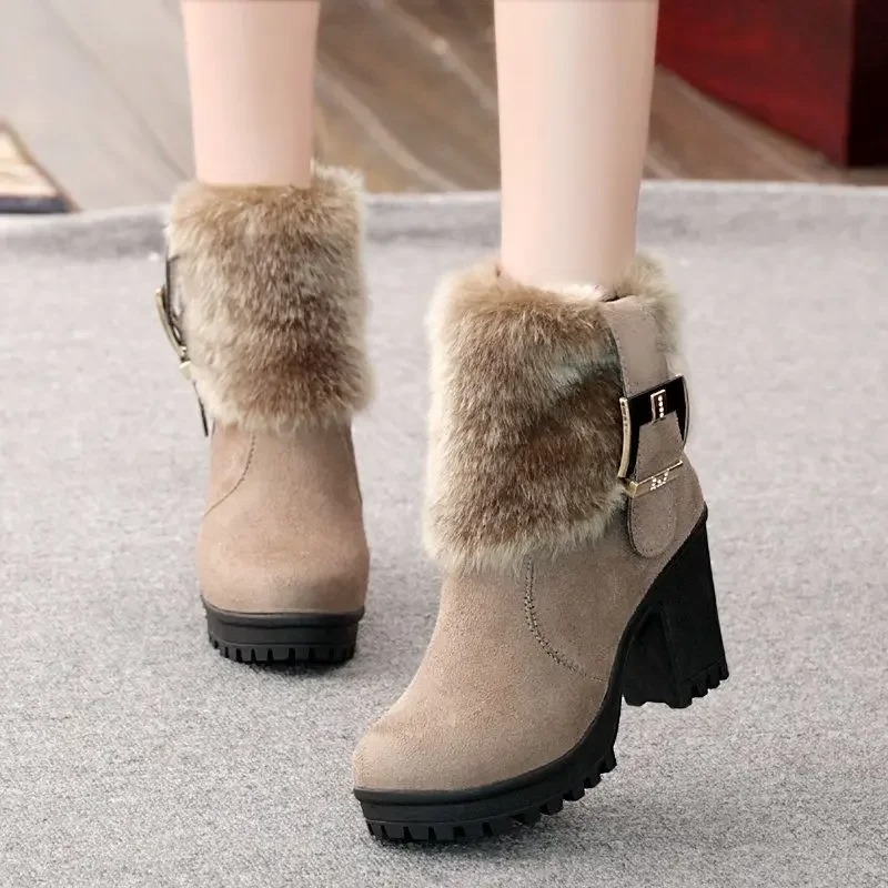 Step into winter with confidence and style with these Square Heel Women’s Winter Ankle Boots, designed for warmth, comfort, and timeless elegance. Featuring a classic buckle detail, these boots add a chic touch to any cold-weather outfit. The soft faux fur lining keeps your feet cozy during snowy days, while the durable platform sole provides stability and insulation from the cold ground. Crafted with a high heel square design, they offer extra height without sacrificing comfort. The sleek black finish makes them versatile for casual, office, or evening wear. Perfect as snow boots or winter ankle boots, these women’s botas combine fashion and function, making them an essential addition to your winter footwear collection. 1