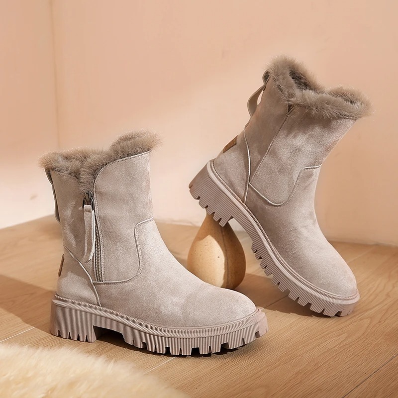 Made with soft suede material, these boots deliver a luxurious look while offering durability for cold weather. 1