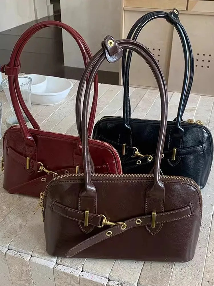 Versatile and stylish, it works as a tote bag or shoulder bag, easily matching casual, office, or streetwear outfits 1