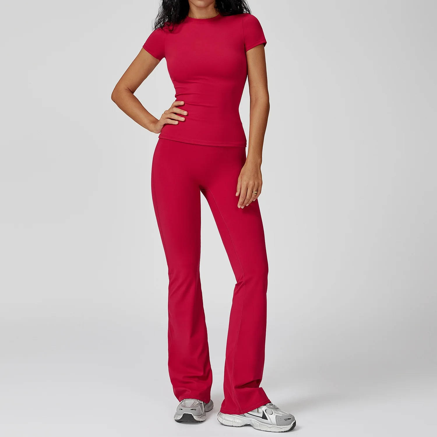 The high waist design offers tummy control and a flattering silhouette, while the fitted top provides secure support and freedom of movement.