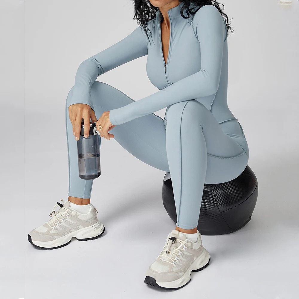 This one-piece gym zipper jumpsuit offers a sculpted, body-hugging fit that enhances your natural shape while providing full coverage and support 1