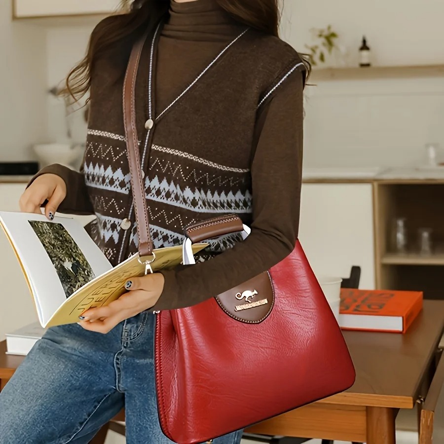 The multiple compartments and pockets provide ample space to neatly store essentials such as your phone, wallet, keys, and cosmetics, keeping everything easily accessible 1